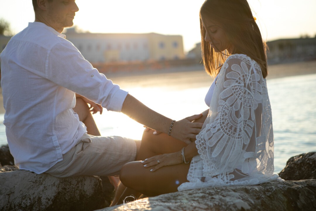 fotografie coppia tramonto spiaggia rimini